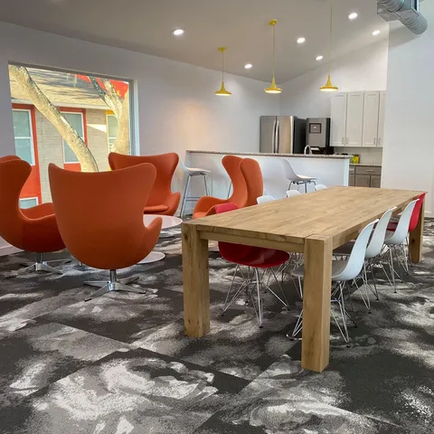 a view of a dining room with furniture