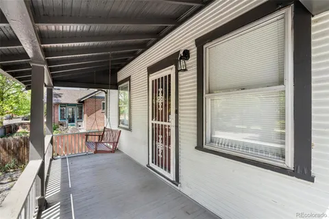 a view of porch with furniture