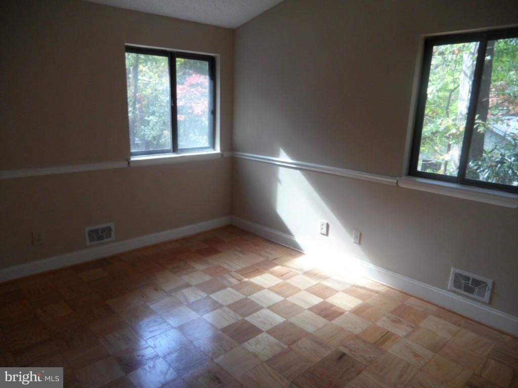 9485 Good Lion Road Columbia, MD 21045 - Photo 15 of 20 an empty room with windows