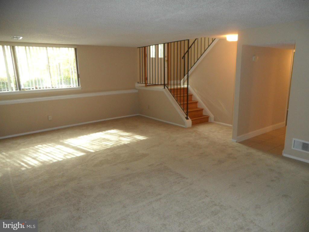 9485 Good Lion Road Columbia, MD 21045 - Photo 19 of 20 an empty room with windows