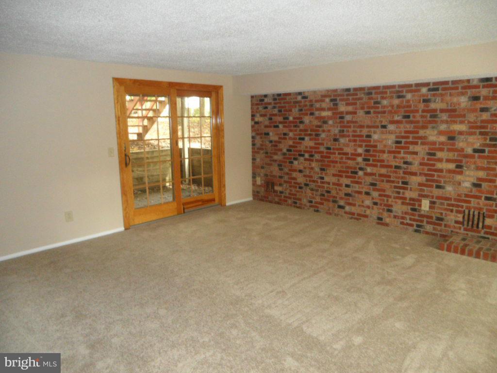 9485 Good Lion Road Columbia, MD 21045 - Photo 3 of 20 a view of an empty room with a window