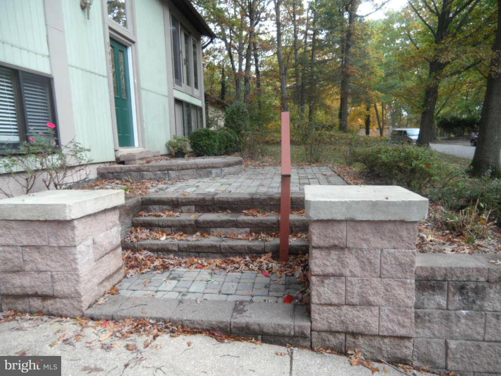 9485 Good Lion Road Columbia, MD 21045 - Photo 6 of 20 a view of a patio with a yard