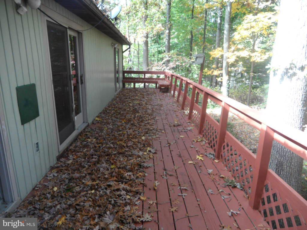 9485 Good Lion Road Columbia, MD 21045 - Photo 7 of 20 a view of balcony with wooden floor