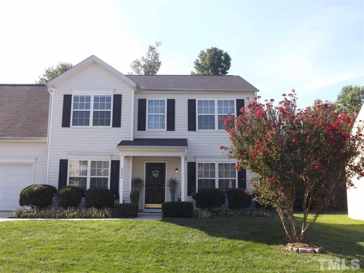 4904 Marathon Lane Raleigh, NC 27616 - Photo 1 of 25 a front view of a house with garden