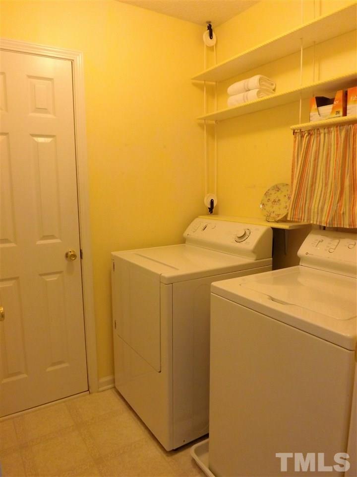 4904 Marathon Lane Raleigh, NC 27616 - Photo 18 of 25 a utility room with dryer and washer