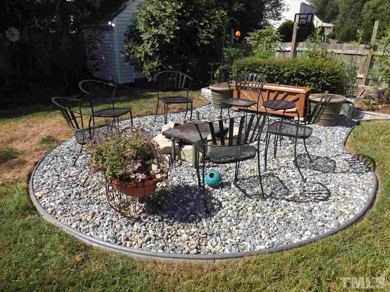 4904 Marathon Lane Raleigh, NC 27616 - Photo 23 of 25 a view of a chairs and table in a patio