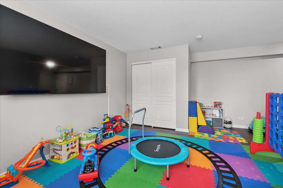 2459 Anna Way Elgin, IL 60124 - Photo 18 of 20 a play room with toys