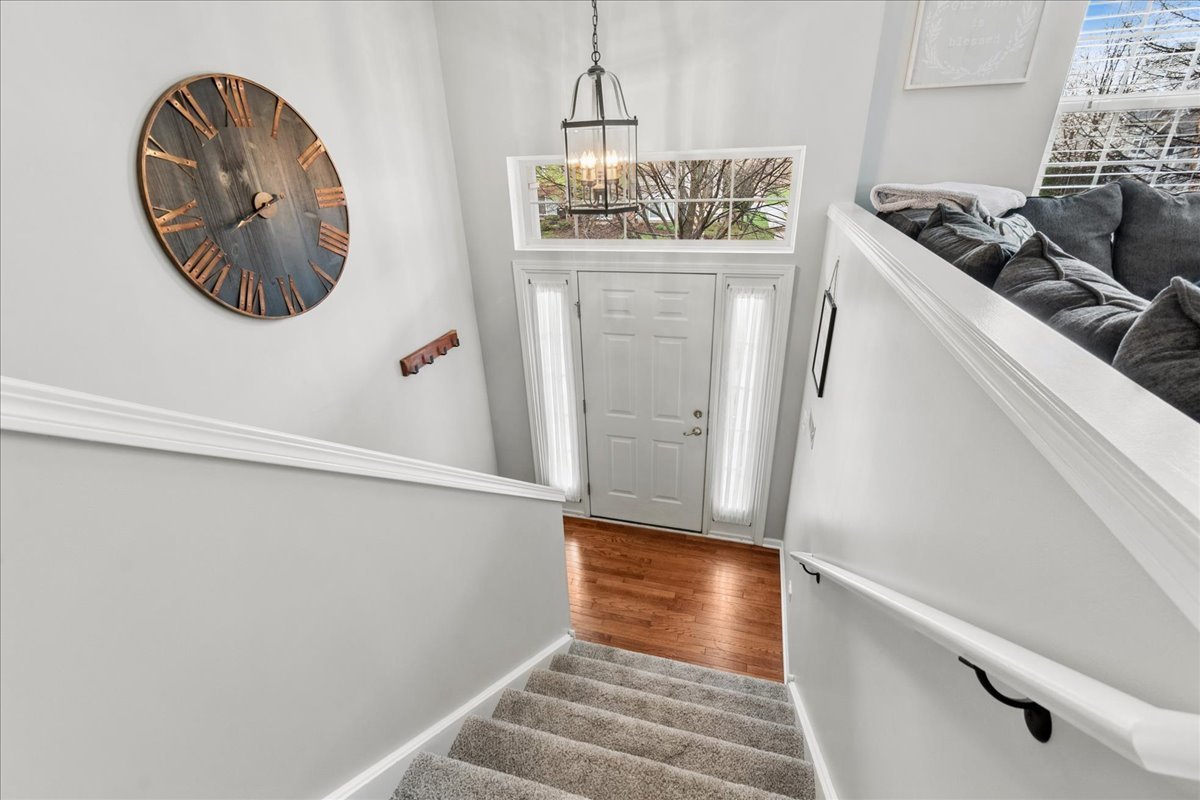 2459 Anna Way Elgin, IL 60124 - Photo 2 of 20 a view of a hallway with washer and dryer