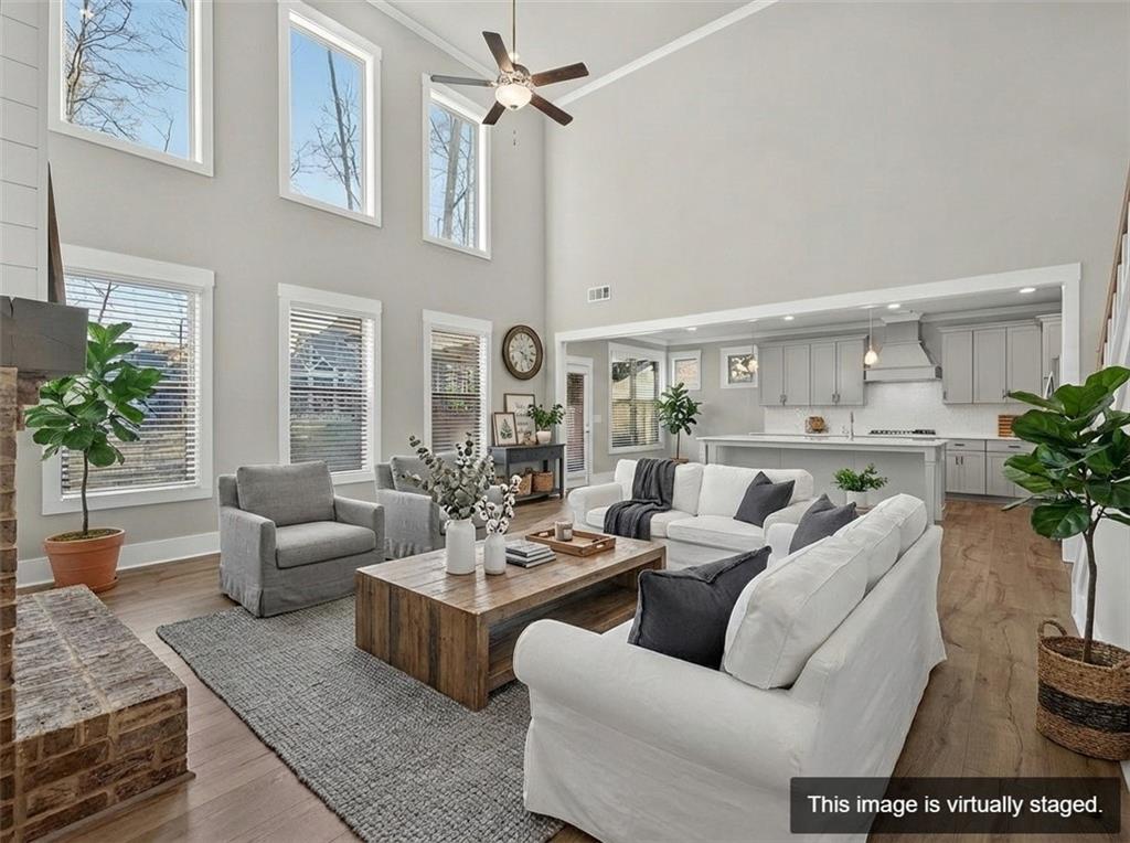 2588 Traditions Way Jefferson, GA 30549 - Photo 16 of 84 a living room with furniture potted plant and a window