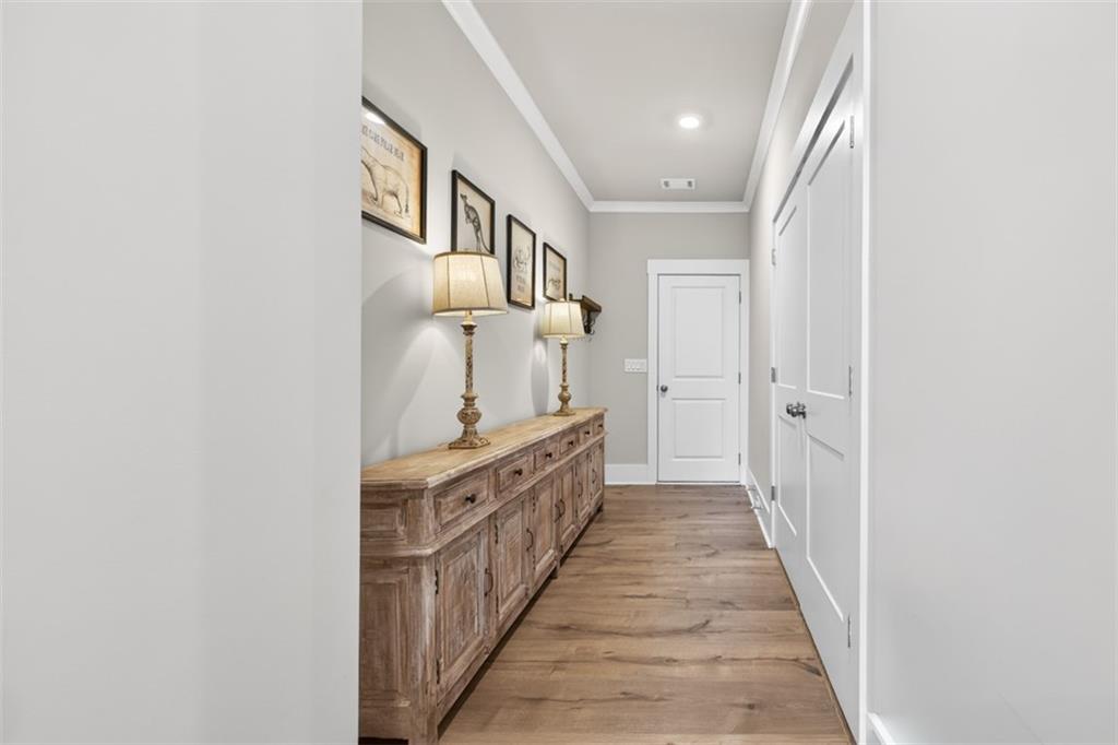 2588 Traditions Way Jefferson, GA 30549 - Photo 40 of 84 a view of a hallway with wooden floor