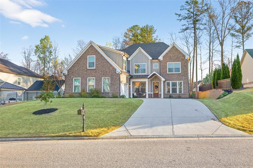 2588 Traditions Way Jefferson, GA 30549 - Photo 4 of 84 a front view of a house with a yard