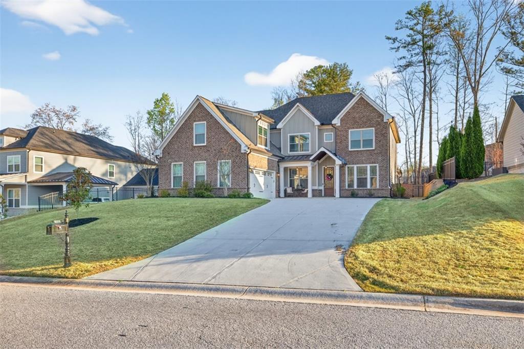 2588 Traditions Way Jefferson, GA 30549 - Photo 6 of 84 a front view of a house with a yard