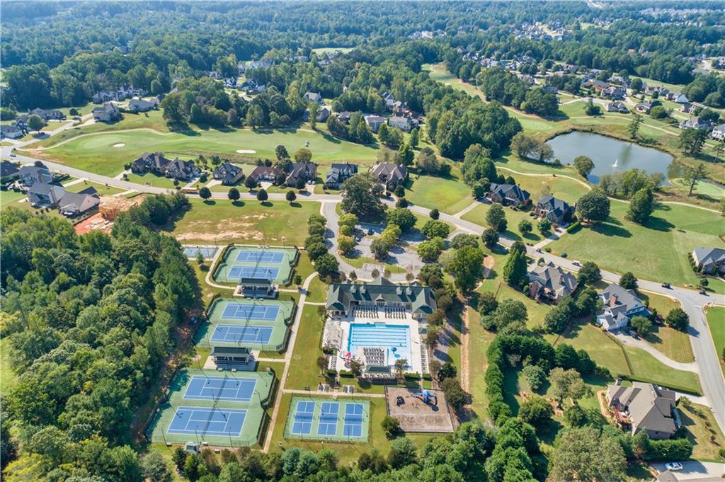 2588 Traditions Way Jefferson, GA 30549 - Photo 74 of 84 an aerial view of residential houses with outdoor space and lake view