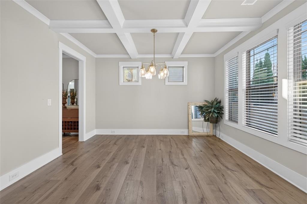 2588 Traditions Way Jefferson, GA 30549 - Photo 8 of 84 wooden floor in an empty room with a window