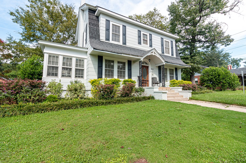1519 16th Avenue Columbus, GA 31901 - Photo 2 of 16 a front view of a house with garden and trees