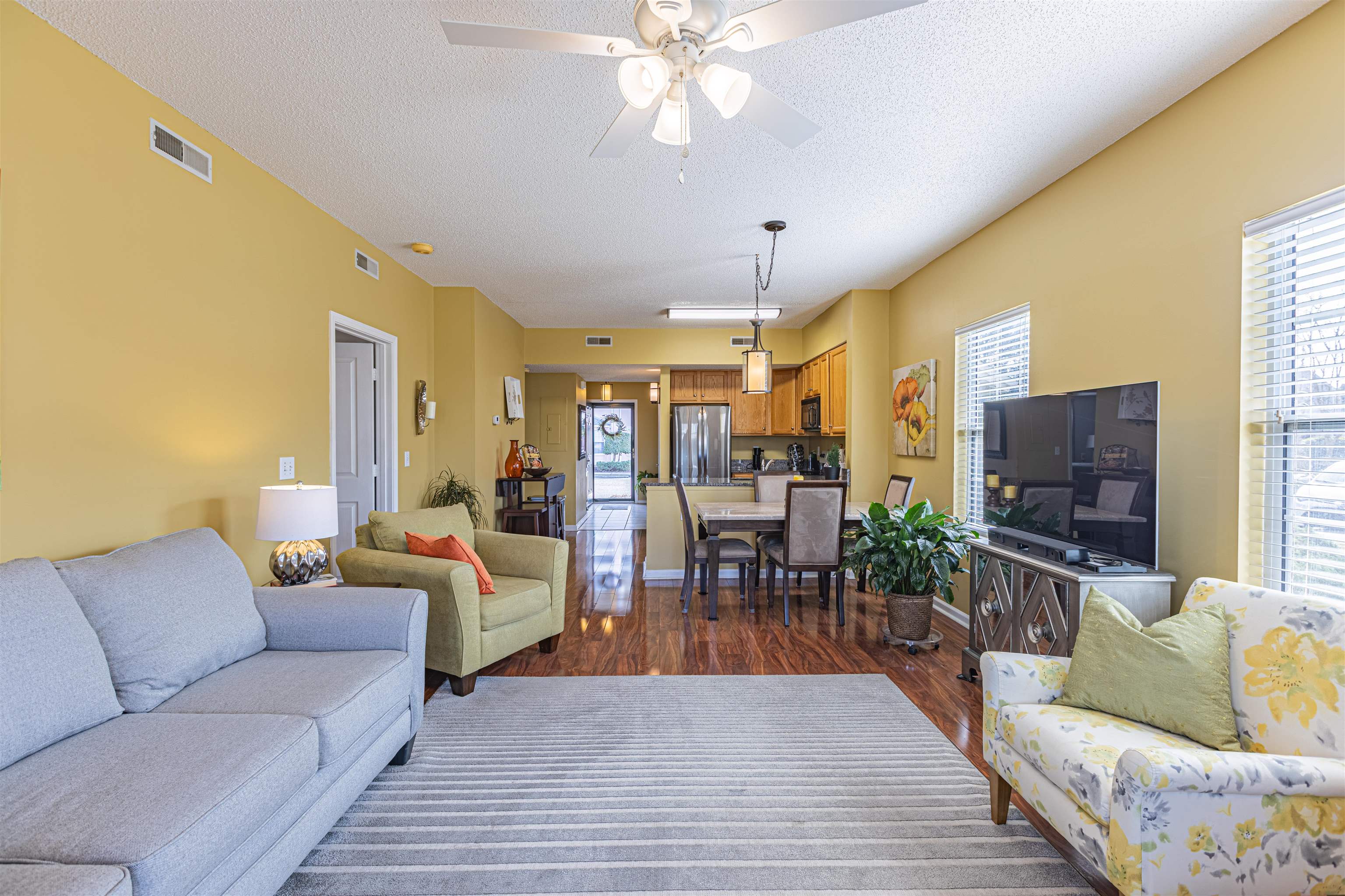4603 Arran Court, Unit A Myrtle Beach, SC 29579 - Photo 8 of 32 Living room with dark wood-style flooring, a textured ceiling, and ceiling fan
