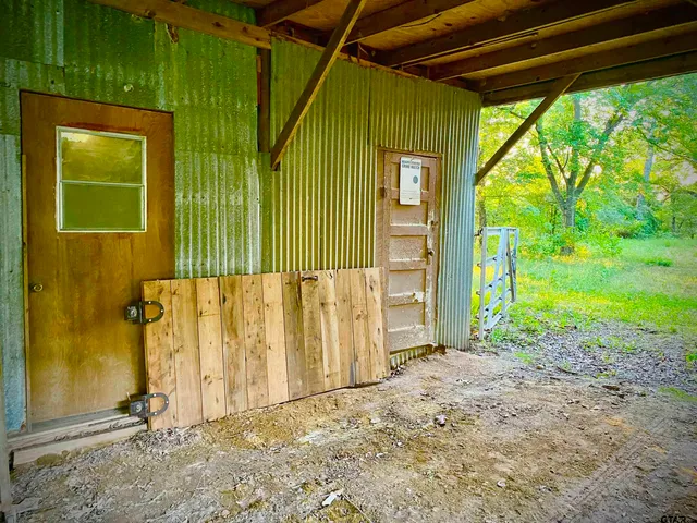 a view of a back yard from a house