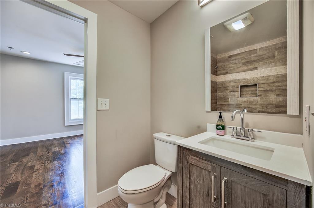 937 Haynes Road Summerfield, NC 27358 - Photo 31 of 50 Jack & Jill style bathroom between rooms on second floor.