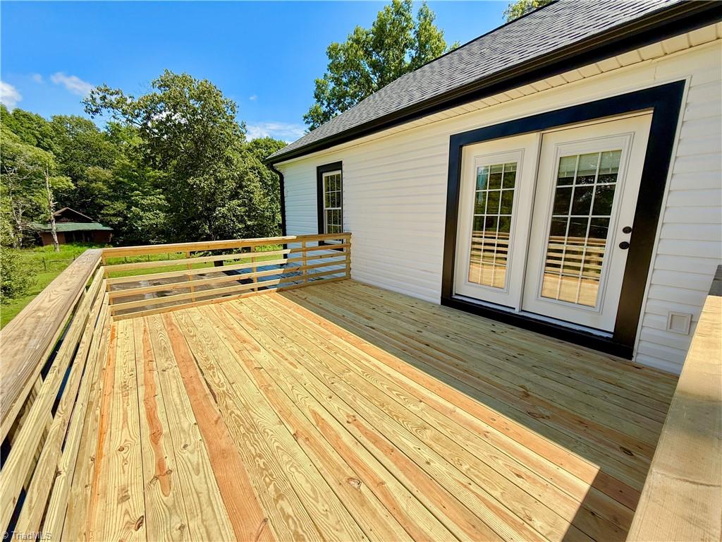 937 Haynes Road Summerfield, NC 27358 - Photo 34 of 50 Private deck off the primary suite.