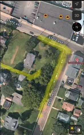 a view of swimming pool with a yard