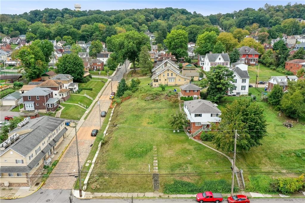 930 State Avenue Coraopolis, PA 15108 - Photo 4 of 12 an aerial view of residential houses with outdoor space and street view