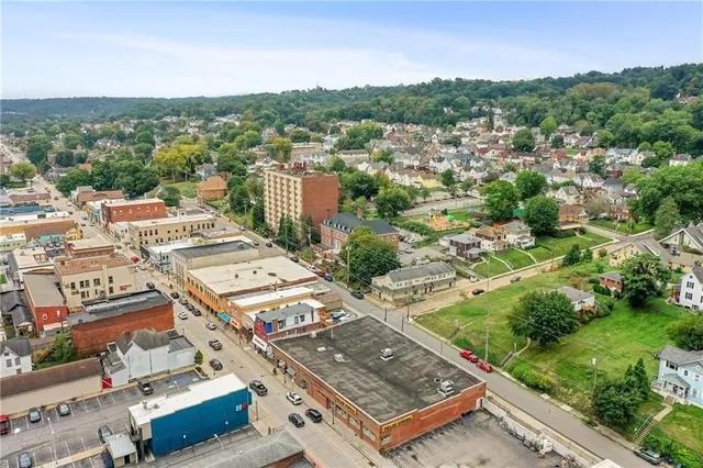 an aerial view of a city with lots of residential buildings
