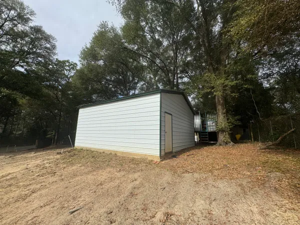 a view of a house with a garage