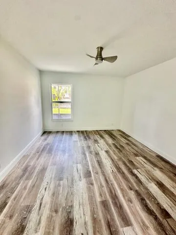 a kitchen with a stove a sink and a refrigerator