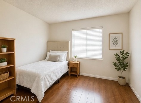 20631 East Vejar Road Walnut, CA 91789 - Photo 11 of 19 a bedroom with a bed and a potted plant