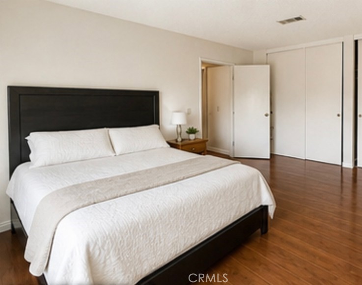 20631 East Vejar Road Walnut, CA 91789 - Photo 13 of 19 a bedroom with a bed and wooden floor