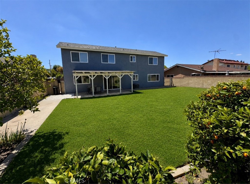 20631 East Vejar Road Walnut, CA 91789 - Photo 17 of 19 a view of a house with garden and a yard