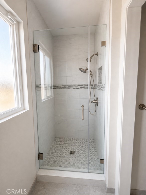 20631 East Vejar Road Walnut, CA 91789 - Photo 7 of 19 a bathroom with a glass shower door