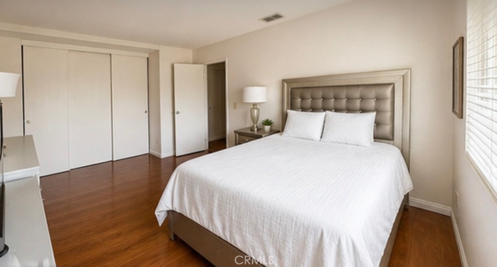 20631 East Vejar Road Walnut, CA 91789 - Photo 8 of 19 a bedroom with a bed and a night stand