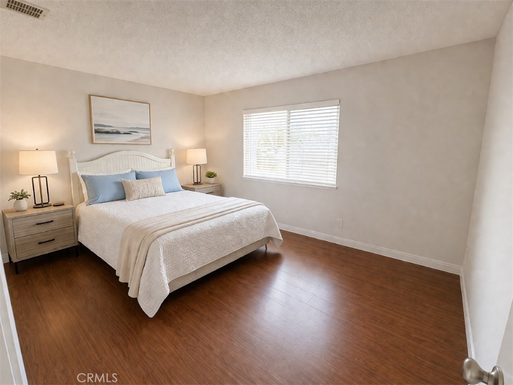 20631 East Vejar Road Walnut, CA 91789 - Photo 9 of 19 a bedroom with a bed and a night stand
