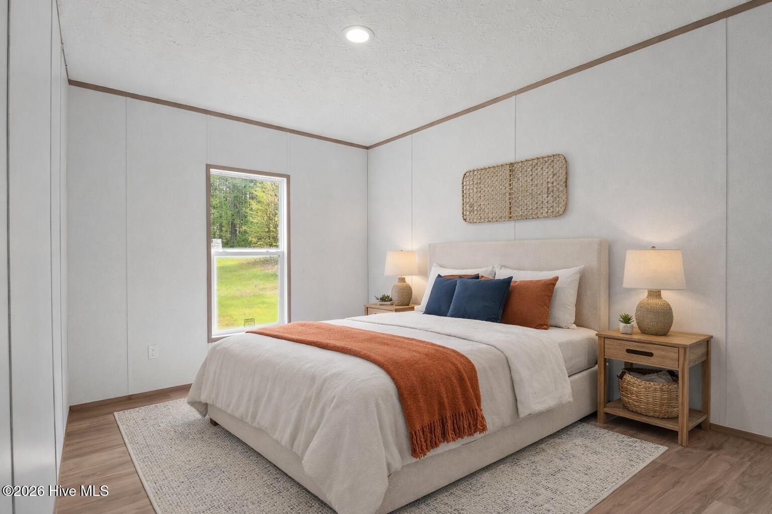 1735 Lynch Road Hollister, NC 27844 - Photo 16 of 39 Cozy bedroom with natural light