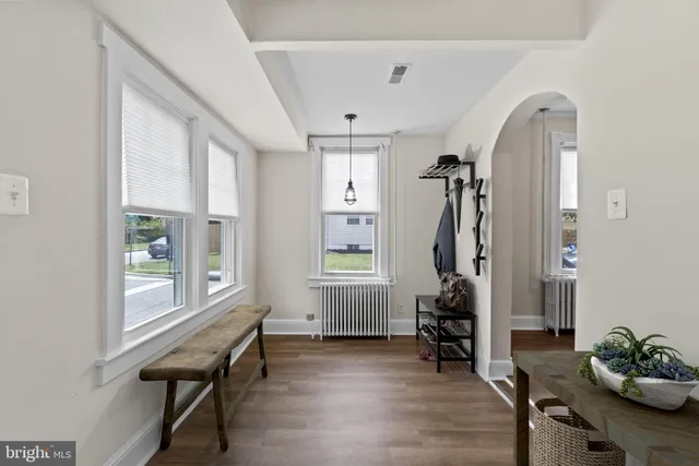 a room with furniture and a window