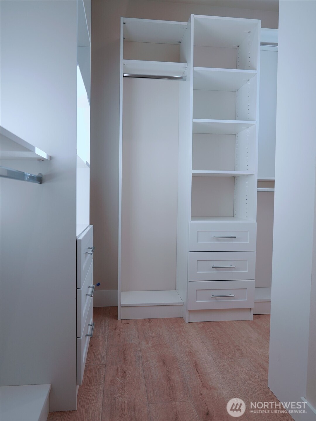 2155 Siddle Loop, Unit 106 Ferndale, WA 98248 - Photo 6 of 12 a view of walk in closet with empty racks