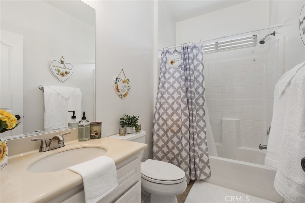 32095 Zion Way Winchester, CA 92596 - Photo 17 of 30 a bathroom with a sink toilet and shower