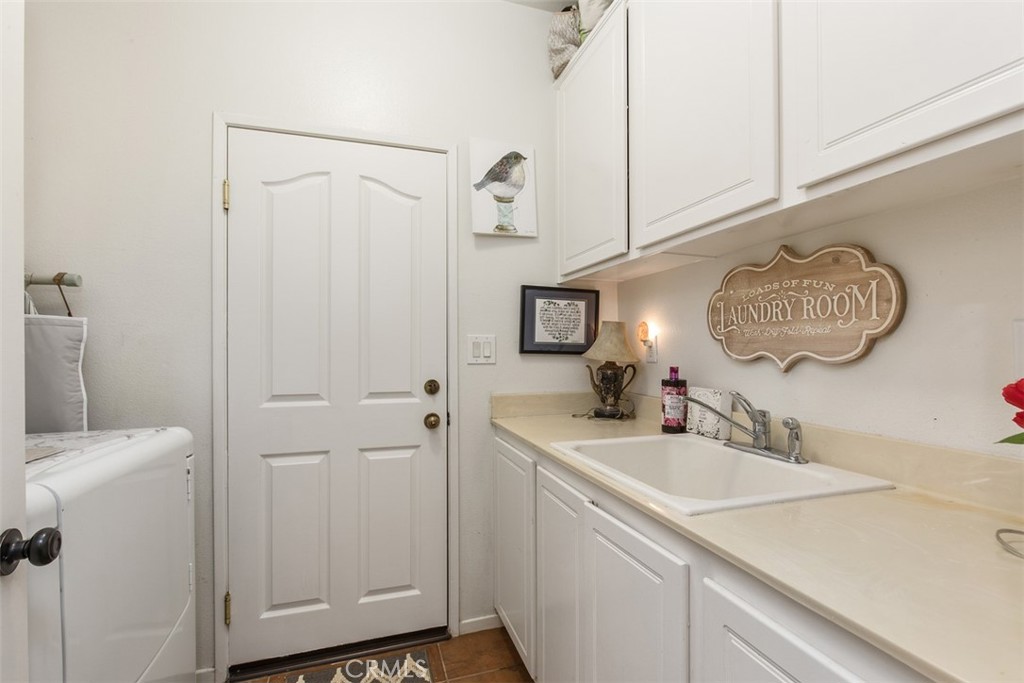 32095 Zion Way Winchester, CA 92596 - Photo 19 of 30 a bathroom with a sink and a mirror