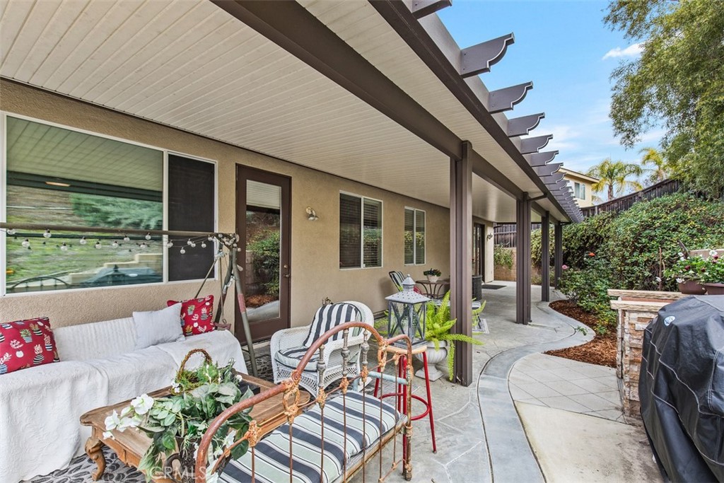 32095 Zion Way Winchester, CA 92596 - Photo 30 of 30 a view of patio with a dining table and chairs