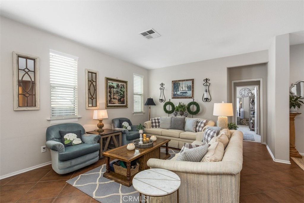 32095 Zion Way Winchester, CA 92596 - Photo 5 of 30 a living room with furniture and a wooden floor