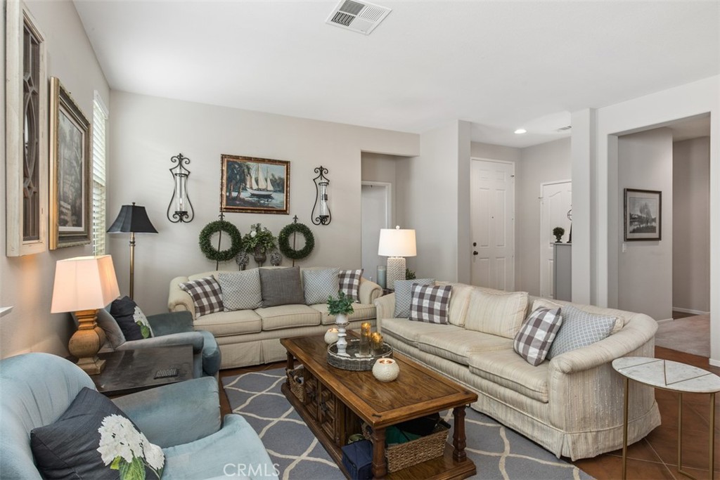 32095 Zion Way Winchester, CA 92596 - Photo 6 of 30 a living room with furniture and a large window