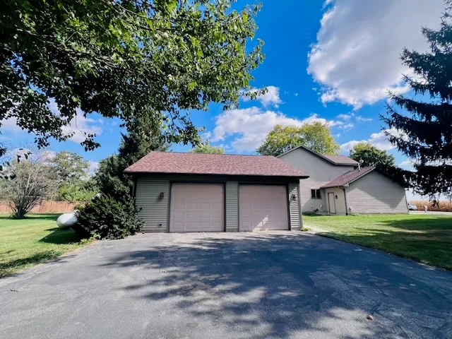 a house with trees in the background