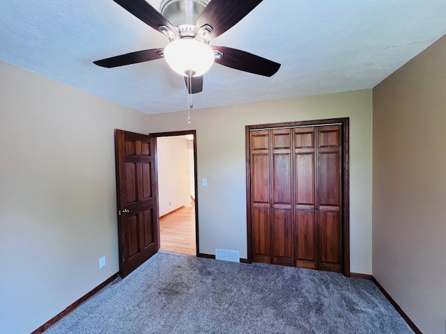 7705 Lakewood Road Weldon, IL 61882 - Photo 26 of 40 an empty room with closet and windows