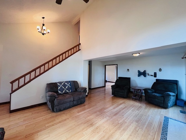 7705 Lakewood Road Weldon, IL 61882 - Photo 3 of 40 a living room with furniture and wooden floor