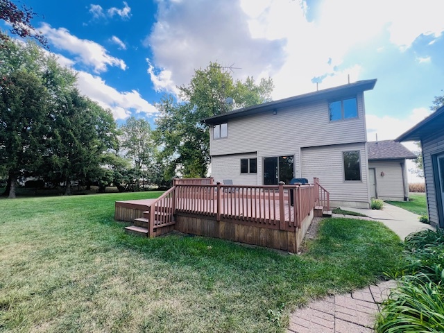 7705 Lakewood Road Weldon, IL 61882 - Photo 36 of 40 a view of a house with a yard and deck
