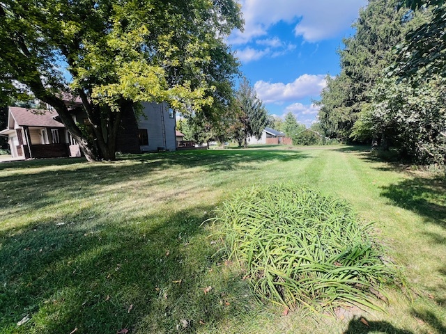 7705 Lakewood Road Weldon, IL 61882 - Photo 37 of 40 a view of a house with a big yard