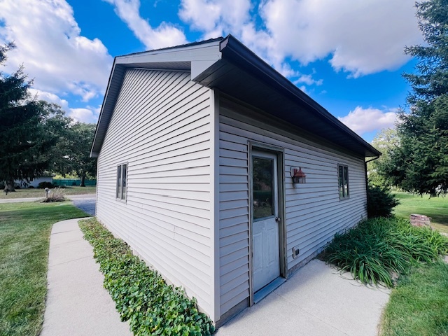 7705 Lakewood Road Weldon, IL 61882 - Photo 38 of 40 a view of a house with a yard