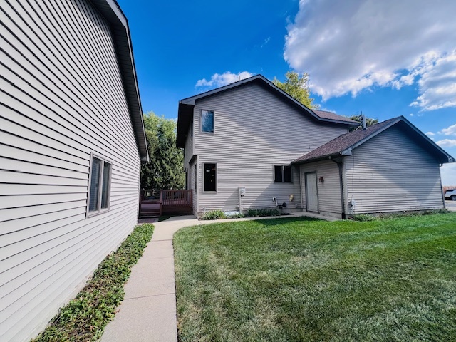 7705 Lakewood Road Weldon, IL 61882 - Photo 39 of 40 a view of a house with a yard