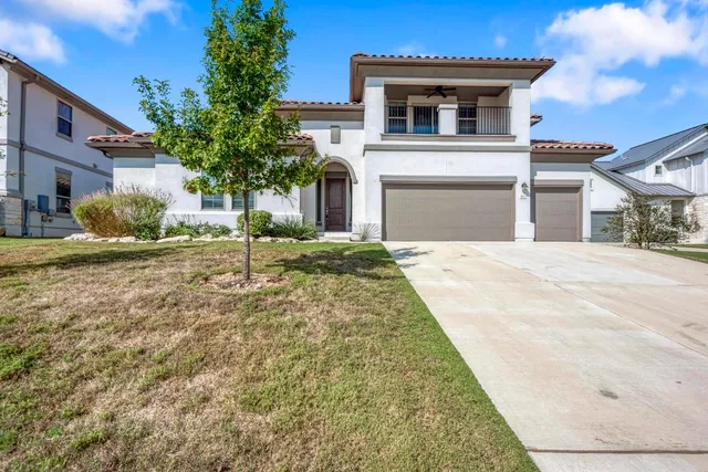 a house with trees in front of it
